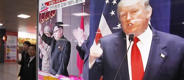 In this Nov. 10, 2016 file photo, a TV screen shows pictures of U.S. President-elect Donald Trump, right, and North Korean leader Kim Jong Un, at the Seoul Railway Station in Seoul, South Korea - Sputnik Türkiye