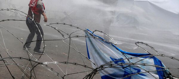 Beyrut'ta, ABD Büyükelçiliği önündeki Kudüs protestosuna polis müdahalesi Beyrut'ta, ABD Büyükelçiliği önündeki Kudüs protestosuna polis müdahalesi - Sputnik Türkiye