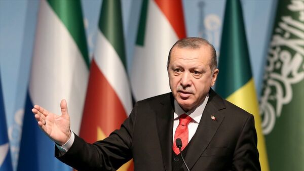 Cumhurbaşkanı Recep Tayyip Erdoğan, İslam İşbirliği Teşkilatı (İİT) Zirvesi'nin ardından basın toplantısı düzenledi - Sputnik Türkiye