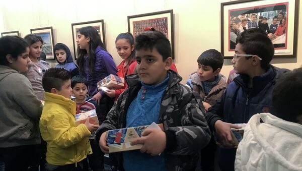 Rusya'nın Şam'daki Bilim ve Kültür Merkezi, Suriyeli çocuklar için Şam'da yılbaşı etkinlikleri düzenledi - Sputnik Türkiye