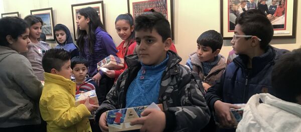 Rusya'nın Şam'daki Bilim ve Kültür Merkezi, Suriyeli çocuklar için Şam'da yılbaşı etkinlikleri düzenledi - Sputnik Türkiye