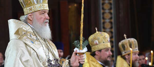 Rus Ortodoks Patriği Kirill, Moskova'daki Kurtarıcı İsa Katedrali'nde düzenlenen Noel gecesi ayininde. - Sputnik Türkiye