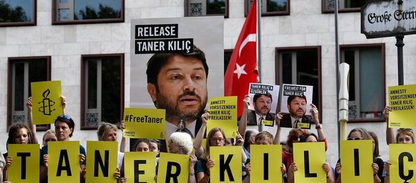 Af Örgütü Türkiye Şubesi Yönetim Kurulu Başkanı Taner Kılıç - Sputnik Türkiye