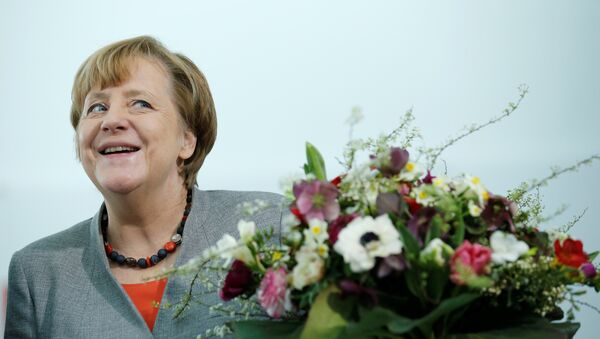 Angela Merkel çiçek - Sputnik Türkiye