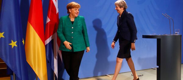 Almanya Başbakanı Angela Merkel ile İngiltere Başbakanı Theresa May Almanya Başbakanı Angela Merkel ile İngiltere Başbakanı Theresa May - Sputnik Türkiye