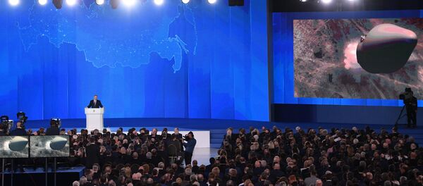 Russian President Vladimir Putin delivers his annual Presidential Address to the Federal Assembly at the Manezh Central Exhibition Hall - Sputnik Türkiye