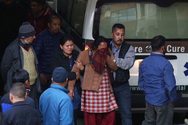 Katmandu'daki uçak kazasında ölenlerin yakınları yasta Katmandu'daki uçak kazasında ölenlerin yakınları yasta - Sputnik Türkiye