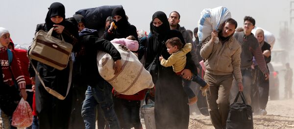 Hammuriye'den tahliye edilen Suriyeliler - Sputnik Türkiye