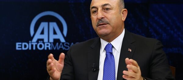 Dışişleri Bakanı Mevlüt Çavuşoğlu, Anadolu Ajansı (AA) Editör Masası'na konuk olarak AA Yönetim Kurulu Başkanı ve Genel Müdürü Şenol Kazancı ile editörlerin sorularını yanıtladı. - Sputnik Türkiye