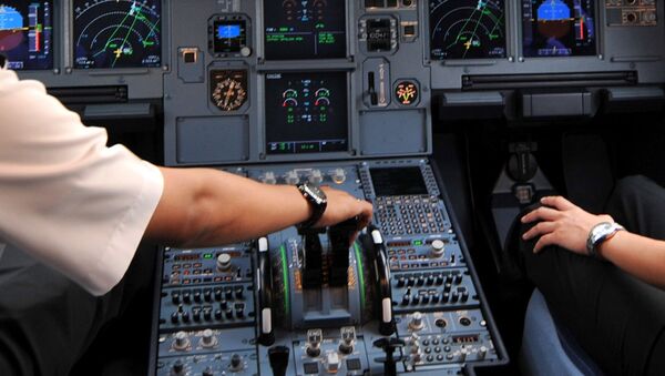 Pilots in the cockpit of an Airbus A320 at Cengkareng airport in Jakarta. File photo - Sputnik Türkiye