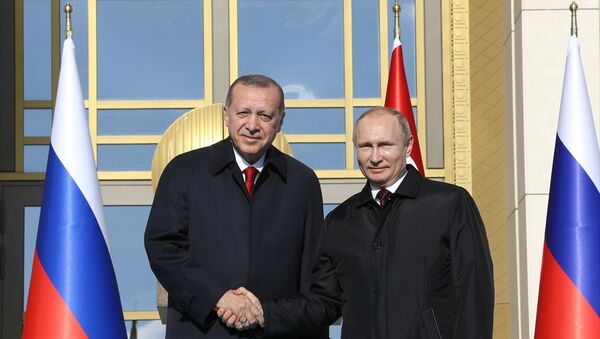 Cumhurbaşkanı Recep Tayyip Erdoğan ve Rusya Devlet Başkanı Vladimir Putin, Cumhurbaşkanlığı Külliyesi'nde video konferans yoluyla Akkuyu Nükleer Santrali Temel Atma Töreni'ne katıldı - Sputnik Türkiye