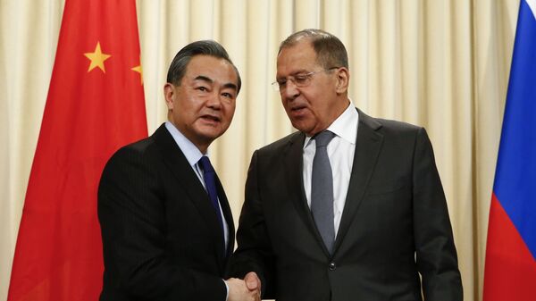 Rusya Dışişleri Bakanı Sergey Lavrov- Çinli mevkidaşı Wang Yi  - Sputnik Türkiye