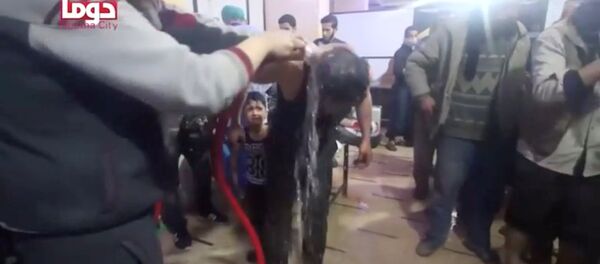 Duma'da kimyasal saldırı iddiası, Beyaz Miğferler'in hastanesinde müdahale - Sputnik Türkiye