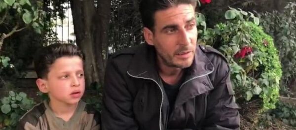 Suriyeli çocuk Hasan Diab ve babası - Sputnik Türkiye