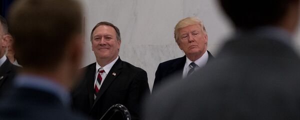 President Donald Trump, accompanied by CIA Director-designate Rep. Michael Pompeo, left, waits to speak at the Central Intelligence Agency in Langley, Va., Saturday, Jan. 21, 2017 President Donald Trump, accompanied by CIA Director-designate Rep. Michael Pompeo, left, waits to speak at the Central Intelligence Agency in Langley, Va., Saturday, Jan. 21, 2017 - Sputnik Türkiye