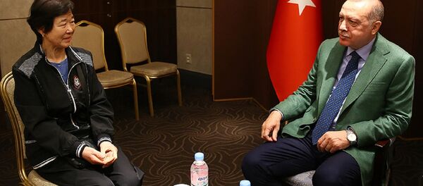 Cumhurbaşkanı Recep Tayyip Erdoğan - Ayla filminin gerçek kahramanı Eunja Kim - Sputnik Türkiye