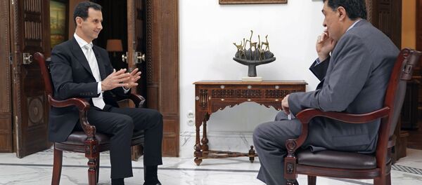 Suriye Devlet Başkanı Beşar Esad, Yunanistan'ın Katimerini gazetesinden Aleksis Papaçelas'ın sorularını yanıtladı. - Sputnik Türkiye