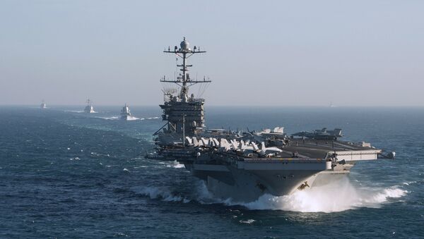 The aircraft carrier group of the United States Navy led by USS Harry S. Truman, front, and a ship escort are seen leaving the port of Norfolk heading for the Middle East - Sputnik Türkiye