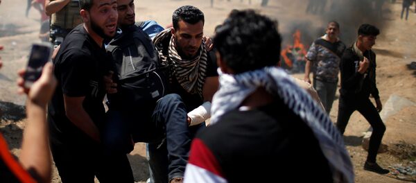 ABD Büyükelçiliği'nin Tel Aviv'den taşınarak İsrail'in kuruluşunun 70. yıldönümü olan bugün Kudüs'te açılmasına karşı Gazze'de protestolar, çatışmalar - Sputnik Türkiye