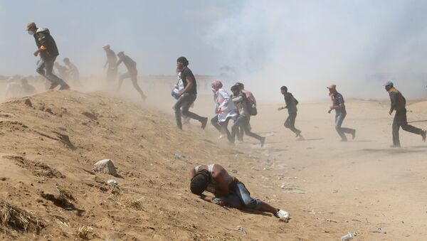 15 Mayıs'taki Nakba Günü'nde İsrail-gazze sınırındaki Filistinli eylemciler - Sputnik Türkiye