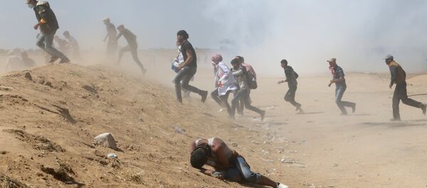 15 Mayıs'taki Nakba Günü'nde İsrail-gazze sınırındaki Filistinli eylemciler - Sputnik Türkiye