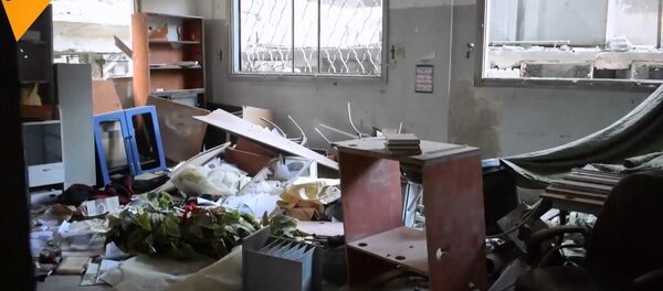 Yermuk’ta IŞİD’in çocuklar için kurduğu okullar açığa çıkarıldı - Sputnik Türkiye