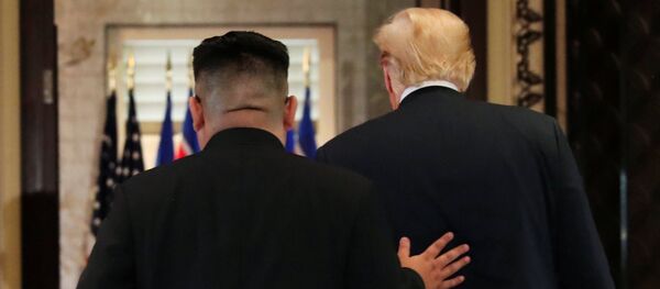 Kim Jong Un ve Donald Trump - Sputnik Türkiye