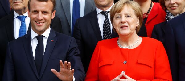Almanya Başbakanı Angela Merkel ve Fransa Devlet Başkanı Emmanuel Macron - Sputnik Türkiye