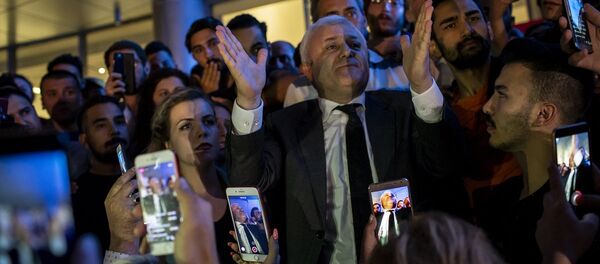 Tuncay Özkan - Sputnik Türkiye