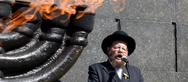 1942'de yüz binlerce Yahudi'nin toplama kamplarına götürüldüğü Varşova'daki Yahudi gettosunda 1943'te çıkan ayaklanma çok kanlı şekilde bastırılmıştı. 19 Nisan 2018'deki 75. yıldönümünde Getto Kahramanları Anıtı'nda tören düzenlendi. - Sputnik Türkiye