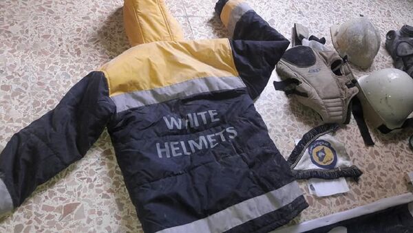 White Helmets uniform found during the search of terrorists’ headquarters in Eastern Ghouta. - Sputnik Türkiye