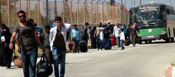 Bayram ziyaretine giden 30 bini aşkın Suriyeli döndü - Sputnik Türkiye