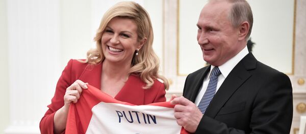 President Vladimir Putin and President of Croatia Kolinda Grabar-Kitarovic during a meeting - Sputnik Türkiye