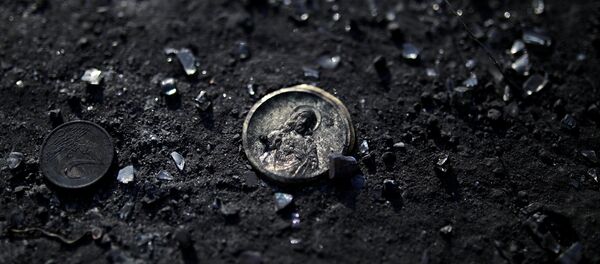 Yangın faciasının yaşandığı Mati köyünde küller arasında bir Hz İsa uğuru - Sputnik Türkiye