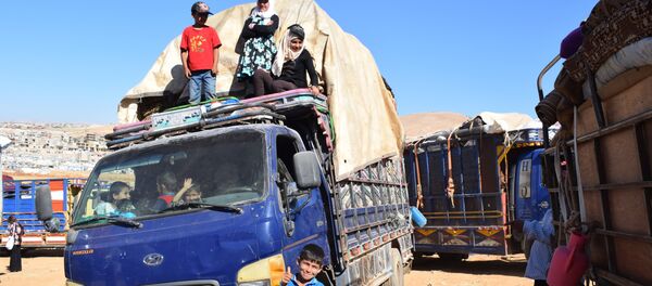 Lübnan'daki 850 Suriyeli mülteci daha evlerine geri döndü - Sputnik Türkiye