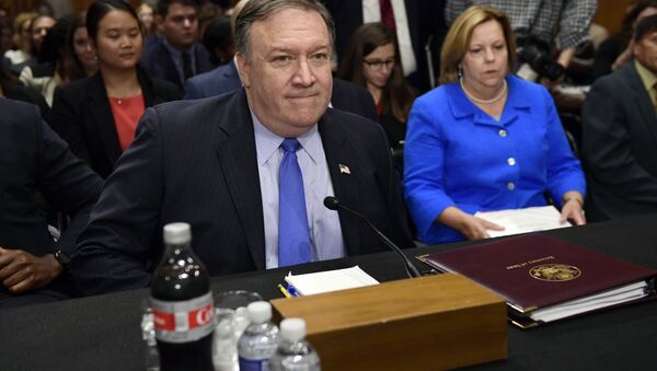 Secretary of State Mike Pompeo arrives to testify before the Senate Foreign Relations Committee on Capitol Hill in Washington, Wednesday, July 25, 2018, during a hearing on diplomacy and national security. - Sputnik Türkiye