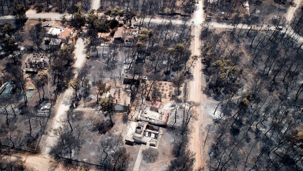 Yunanistan’nın Mati bölgesinde yangından zarar gören alanlara havadan bakış. - Sputnik Türkiye