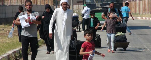 Bayram ziyaretine giden 49 bin Suriyeli döndü - Sputnik Türkiye