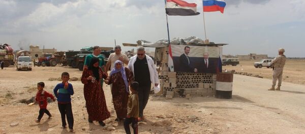 İdlib'deki halkın Rusya yardımıyla dönüşü - Sputnik Türkiye