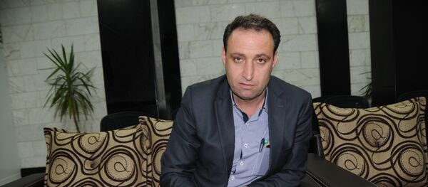 Demokratik Suriye Meclisi yöneticisi Ekrem Husso - Sputnik Türkiye