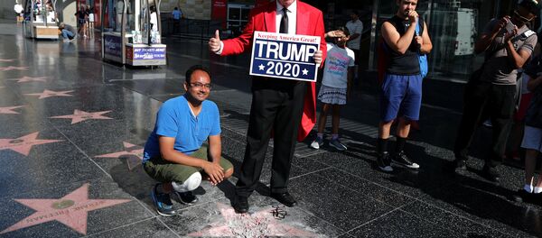 Donad Trump'ın Şöhretler Bulvarı'nda yer alan zarar verilmiş haldeki yıldızı Donad Trump'ın Şöhretler Bulvarı'nda yer alan zarar verilmiş haldeki yıldızı - Sputnik Türkiye