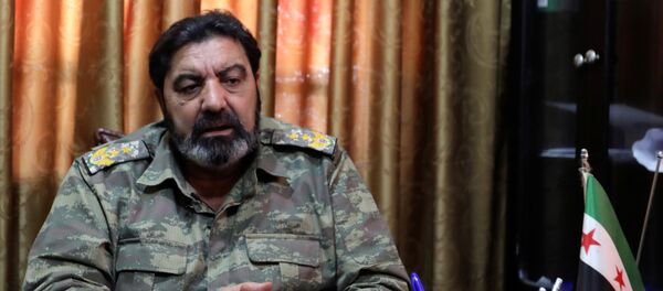 'Suriye Ulusal Ordusu'nun başındaki Albay Haitham Afisi 'Suriye Ulusal Ordusu'nun başındaki Albay Haitham Afisi - Sputnik Türkiye