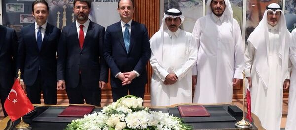 Türkiye Cumhuriyet Merkez Bankası ile Katar Merkez Bankası arasında Doha’da düzenlenen törenle ikili Para Takası (Swap) Anlaşması imzalandı. - Sputnik Türkiye