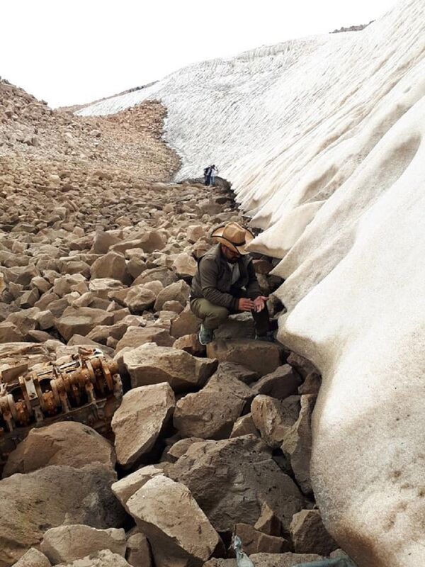Uçak parçalarının bir kısmının buzulların altında kaldığı belirtildi.  - Sputnik Türkiye