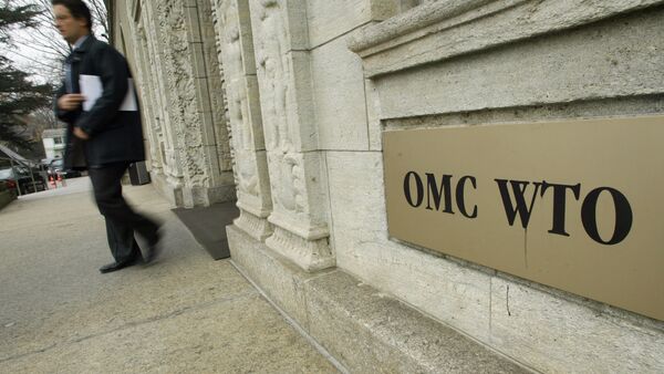A person gets out of the World Trade Organization (WTO) headquarter in Geneva (File) - Sputnik Türkiye