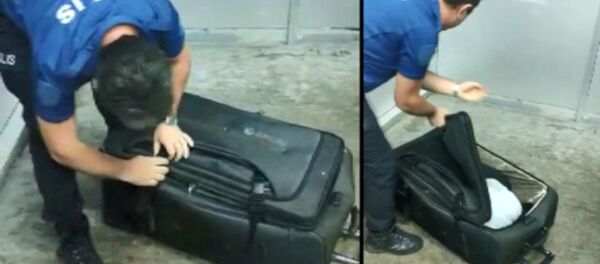 Türkiye'ye giriş yasağını, valizin içine girerek çiğnemek istedi Türkiye'ye giriş yasağını, valizin içine girerek çiğnemek istedi - Sputnik Türkiye