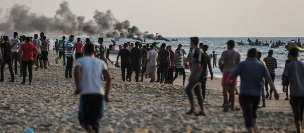 Gazze ablukasını kırmak maksadıyla 50 tekne ile Gazze Şeridi'nin kuzeyindeki Beyt Lahya sahilinden denize açılan Filistinli eylemcilere, İsrail Deniz Kuvvetleri müdahale etti. - Sputnik Türkiye