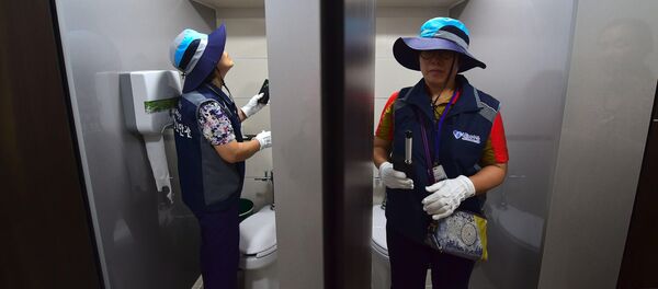 Güney Kore'nin başkenti Seul'deki umumi tuvaletlerde gizli kamera araması - Sputnik Türkiye