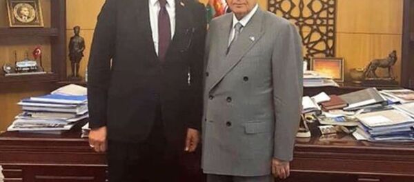 MHP Genel Başkanı Devlet Başkanı Devlet Bahçeli- Adana Büyükşehir Belediye Başkanı Hüseyin Sözlü - Sputnik Türkiye