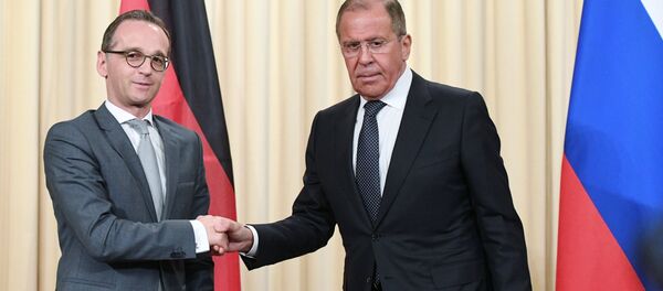 Russian Acting Foreign Minister Sergei Lavrov and German Foreign Minister Heiko Maas, left, at a joint news conference following a meeting at the Russian Foreign Ministry Reception House - Sputnik Türkiye